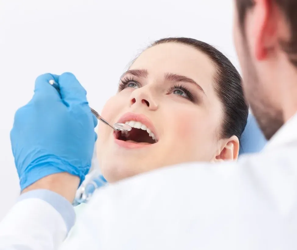 Checking The Womans' Teeth — Runcorn, QLD — Runcorn Dental