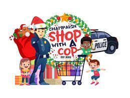 A police officer is standing next to a shopping cart filled with gifts.
