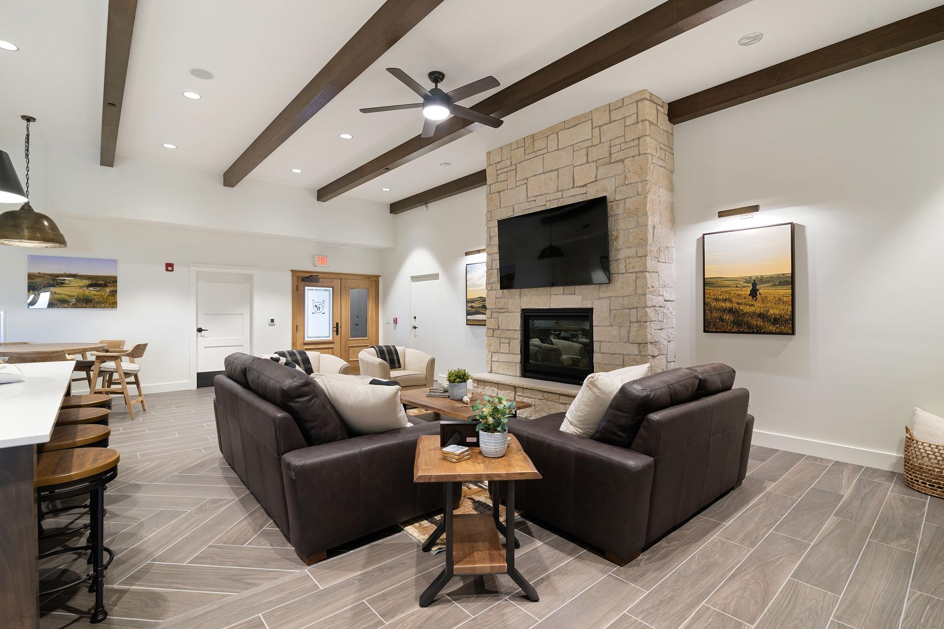 A living room filled with furniture and a fireplace.