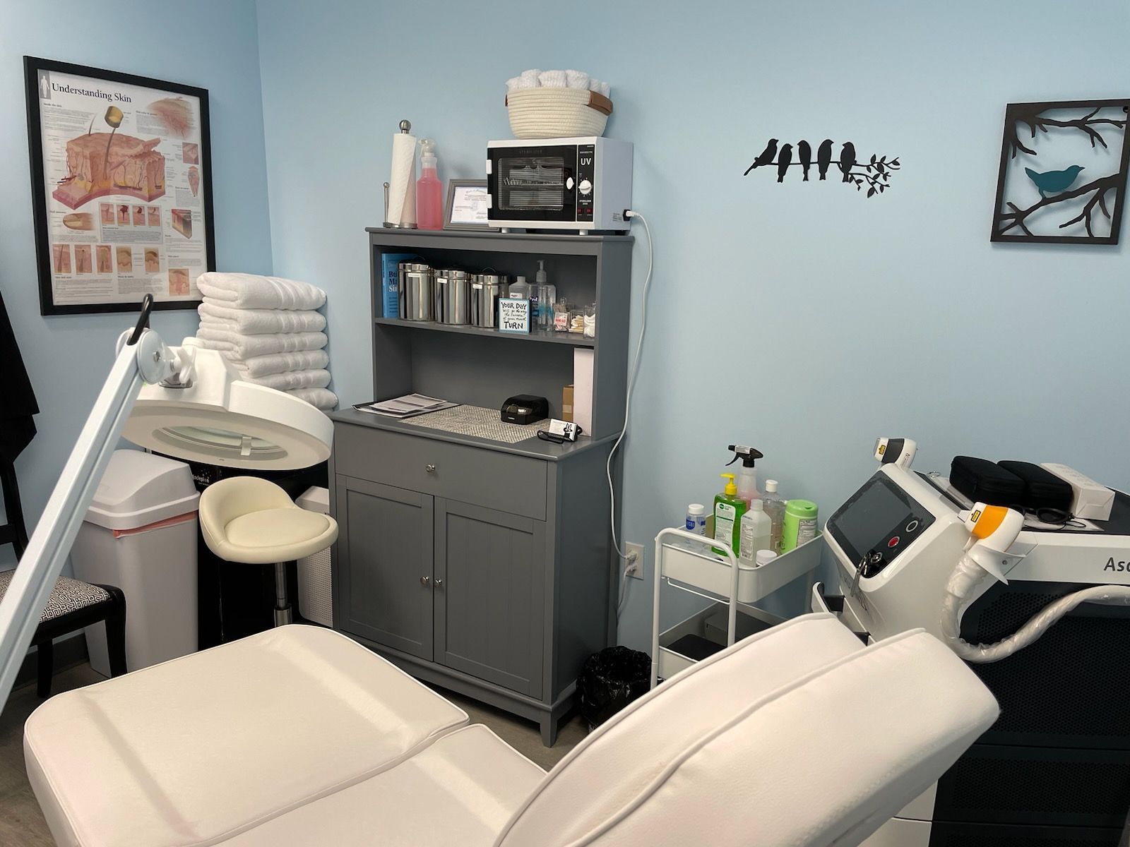 A spa room with treatment bed.