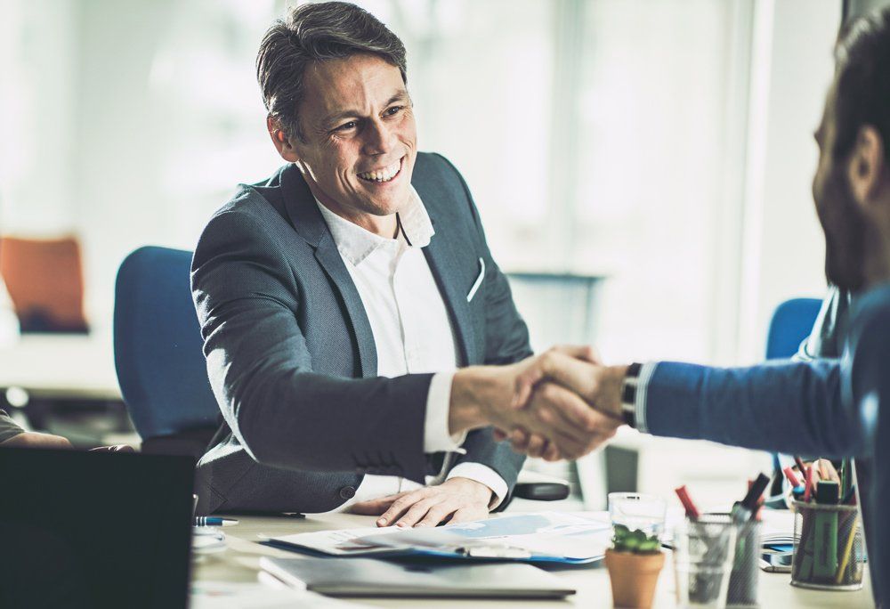 Hand Shake With Businessman — Greenville, TX — F5 Insurance Solutions