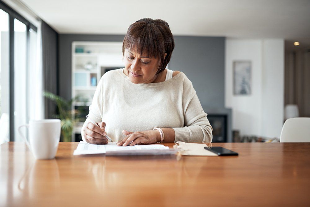 Signing A Contract — Greenville, TX — F5 Insurance Solutions