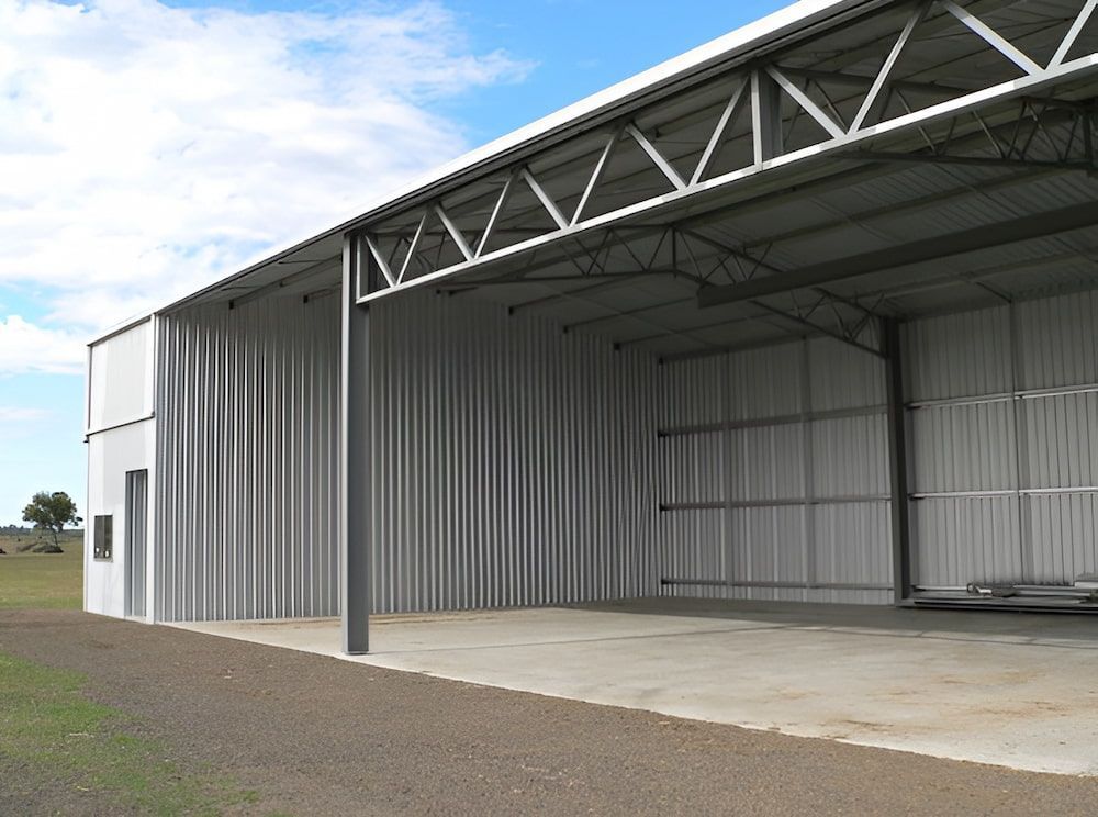 A Large Metal Building With an Open Front, Light-colored Walls — Northern Rivers Sheds in South Lismore, NSW