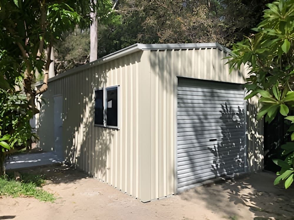 Tan Metal Shed With a Gray Garage Door, Window, and Side Door — Northern Rivers Sheds in South Lismore, NSW