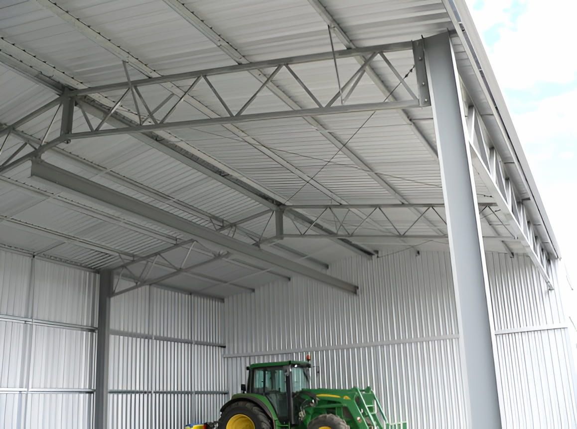 Inside of a Metal Shed With a Tractor — Northern Rivers Sheds in South Lismore, NSW