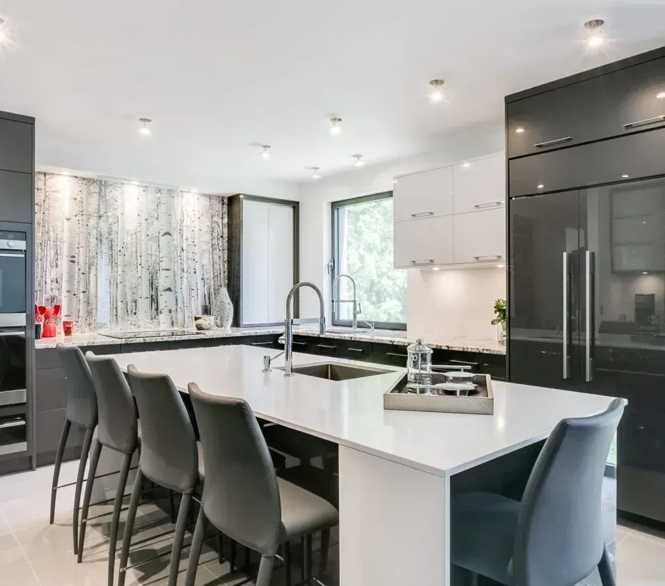 There is a large island in the middle of the kitchen.
