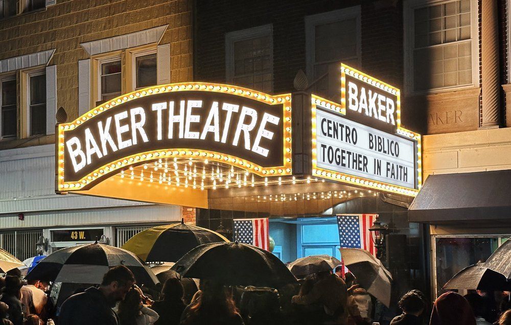 Baker Theatre lit up at night, marquee with