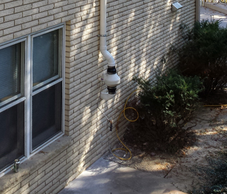Pipe outside a house