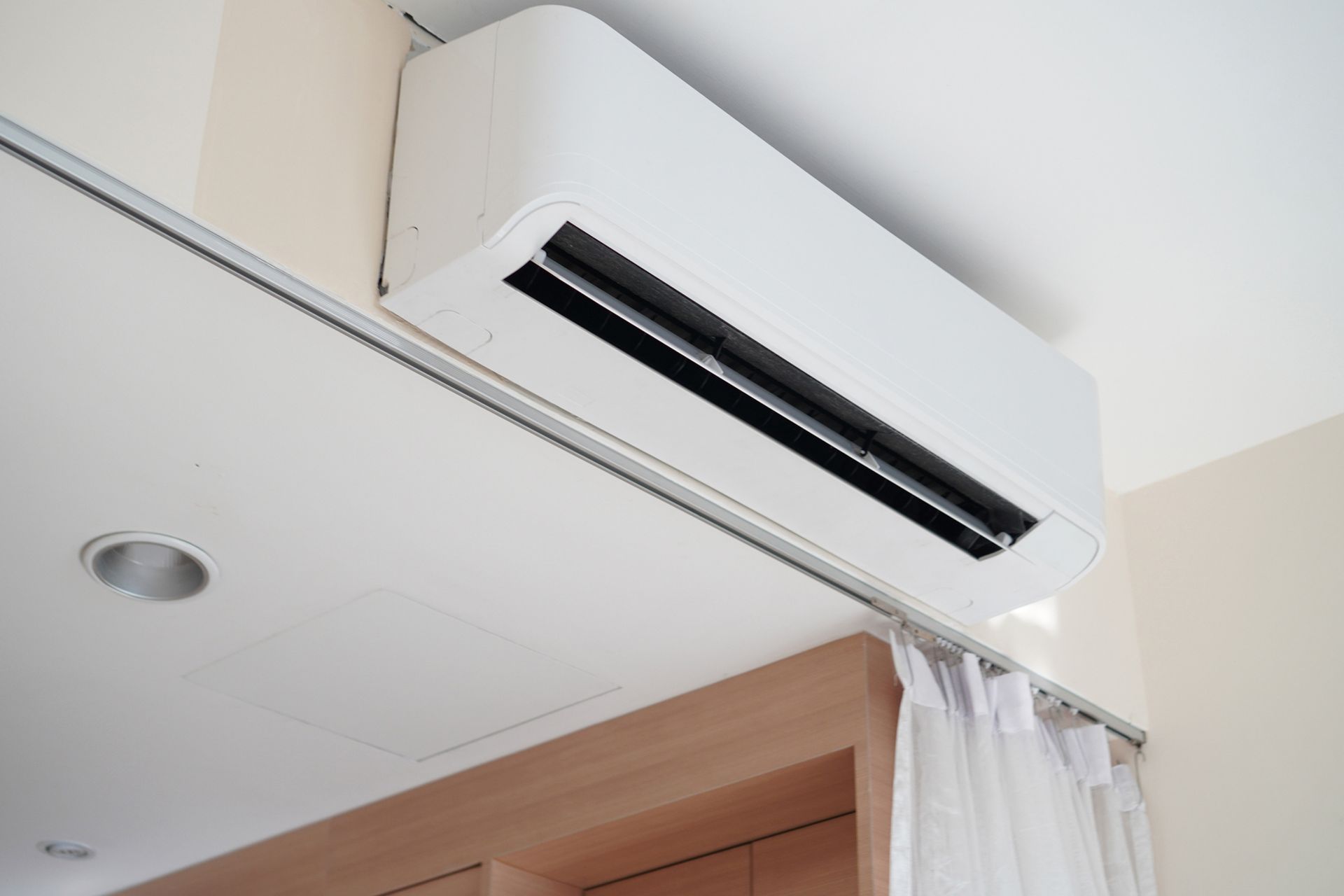 Wall Hung Air Conditioner — Tucson, AZ — Orozco Brothers Plumbing Heating and Cooling Wall Hung Air Conditioner — Tucson, AZ — Orozco Brothers Plumbing Heating and Cooling
