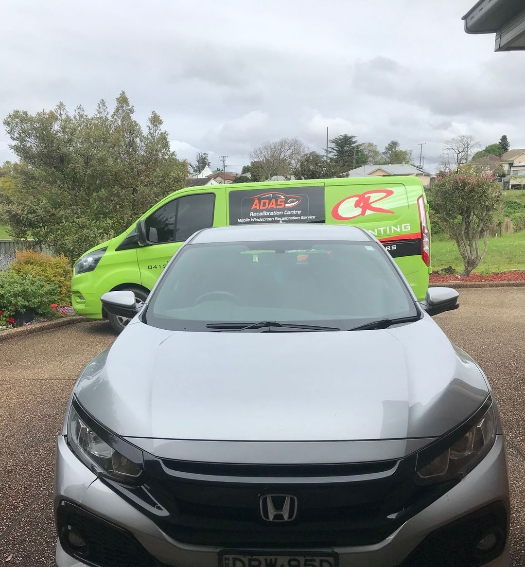 Car Sedan at the Parking Lot — Windscreen Repair Central Coast