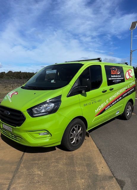 Green Service Van Featuring Stylish Dark Window Tinting — Window Tinting in Newcastle
