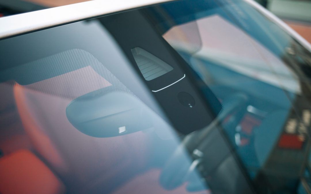 Skilled Glazier Using Tools to Repair a Windscreen Crack — Window Tinting in Singleton