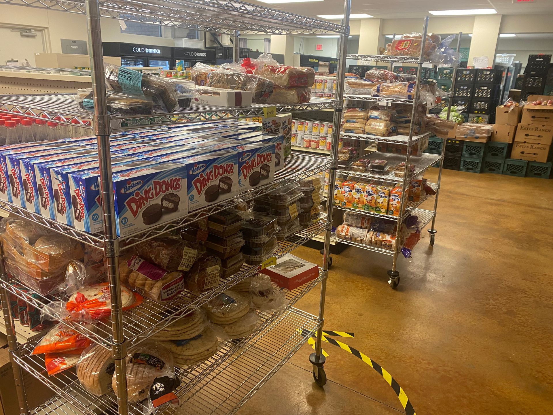 A grocery store filled with lots of food on shelves.