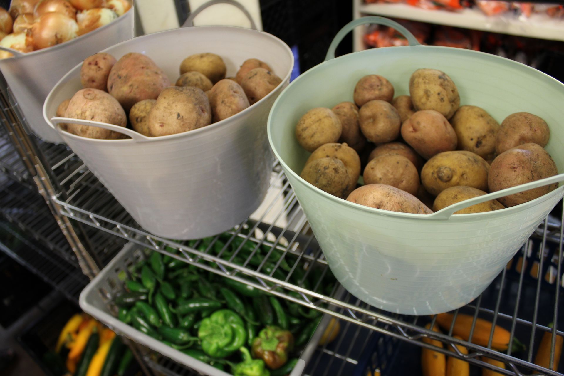 A volunteer and shopper in the pantry