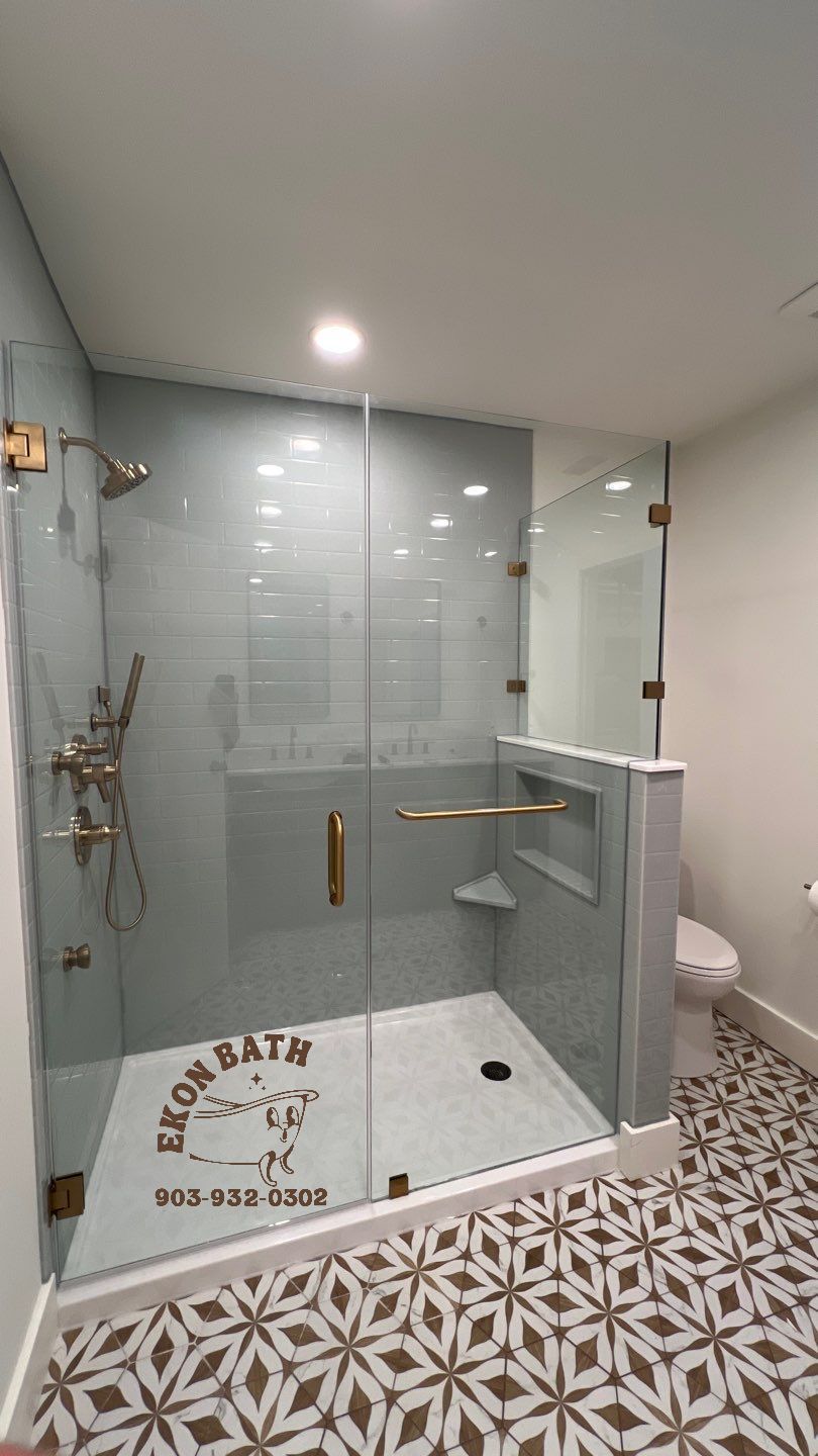 Designer Master Bathroom Walk In Shower with The Onyx Collection and Frameless Shower Glass.