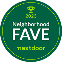 A green circular Nextdoor Neighborhood Fave 2023 award badge with a trophy icon.