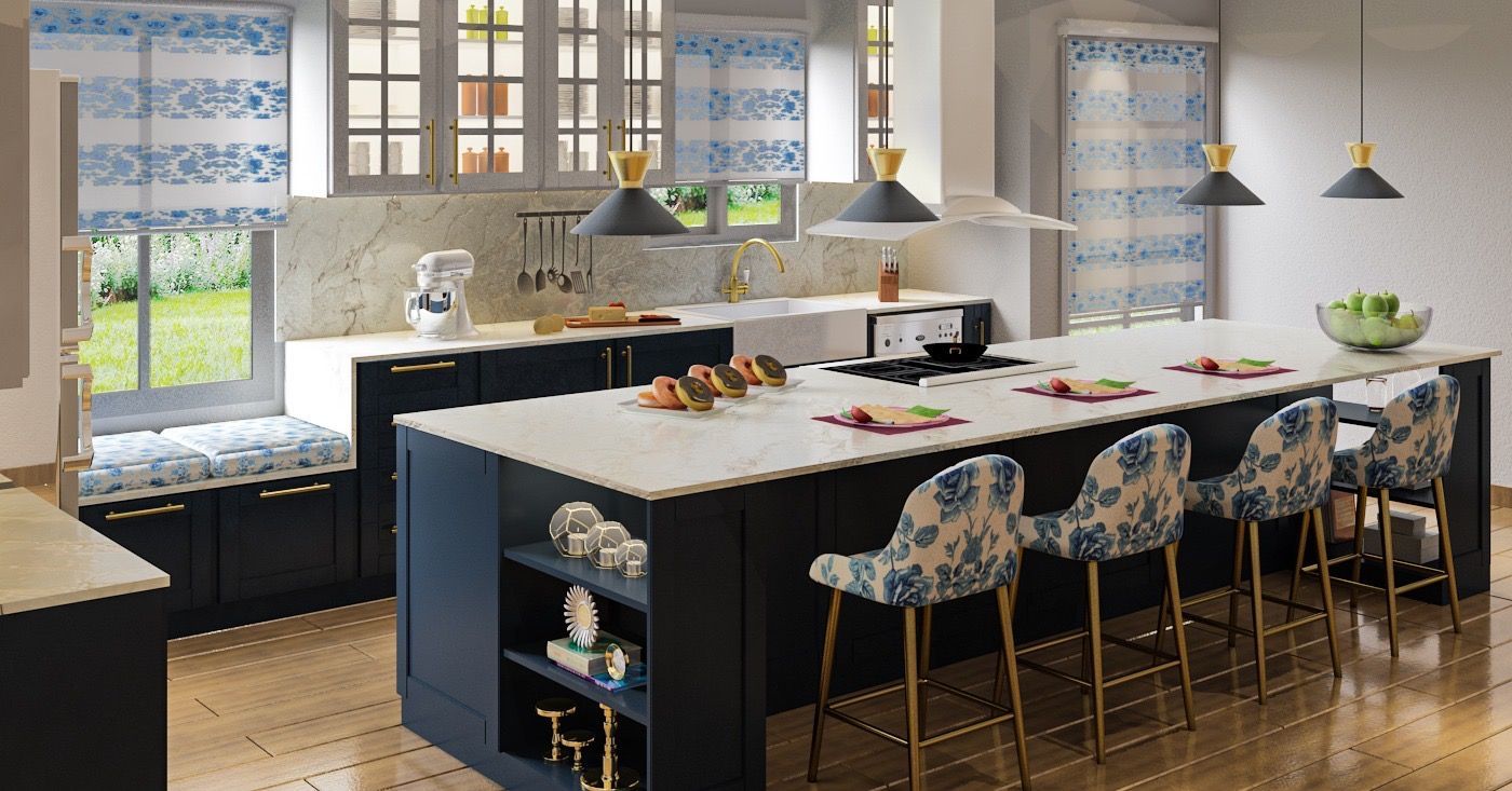 Blue and white kitchen with island, seating, and floral patterned shades.