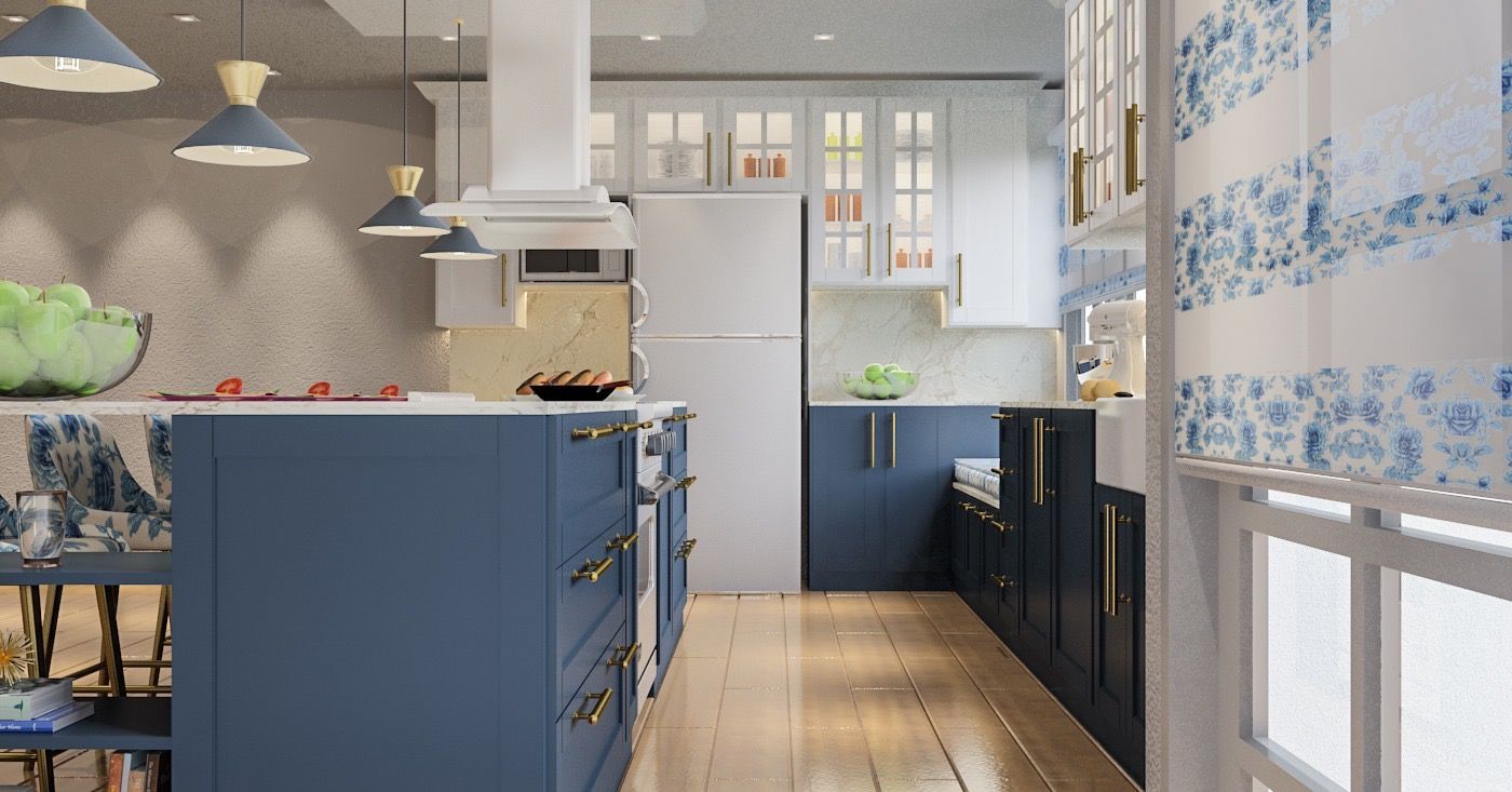Blue and white kitchen with island and light wood flooring.