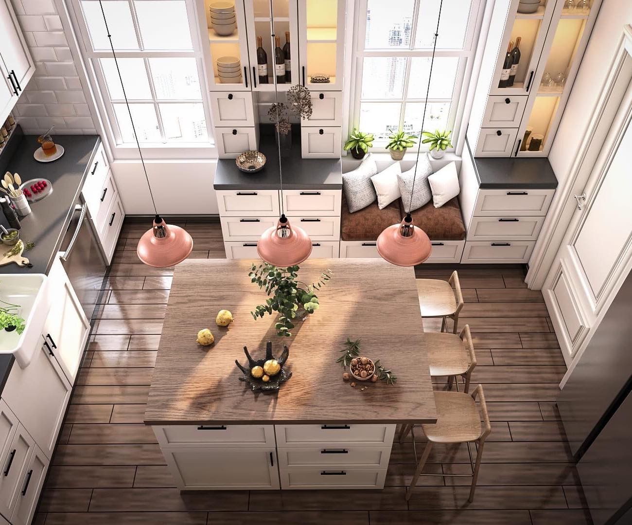 A bright kitchen with white cabinets, a wooden island, and pink pendant lights.