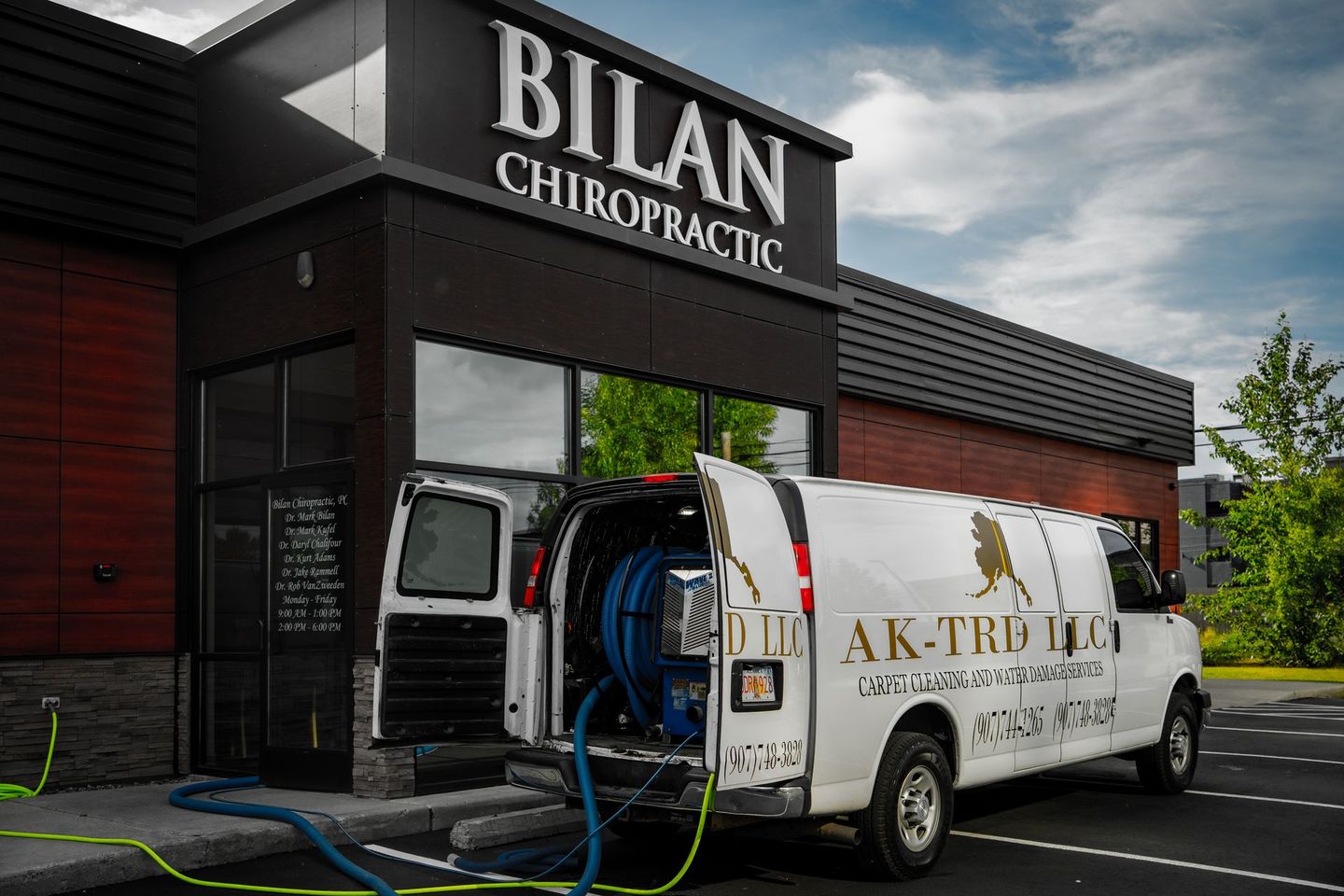 Work Van. showing hoses used in carpet cleaning