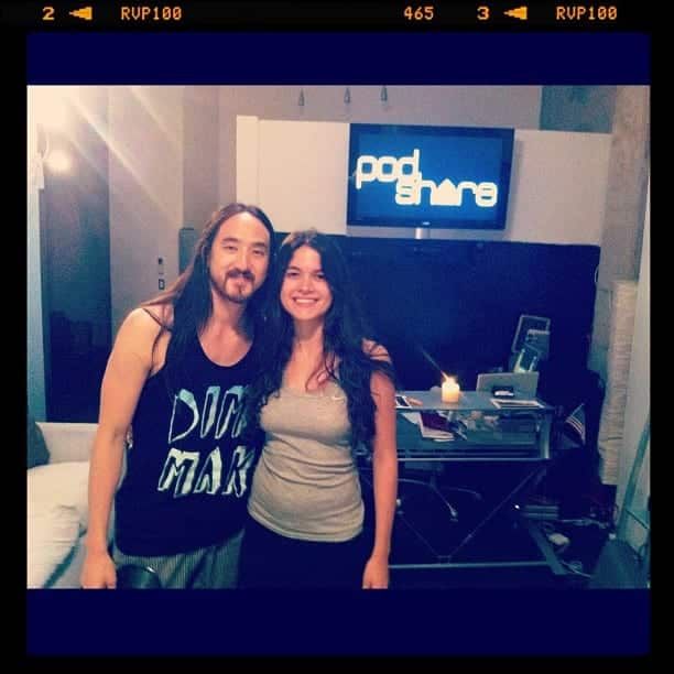 DJ Steve Aoki and Elvina Beck pose in front of
