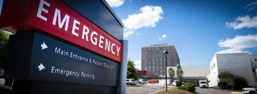 A large hospital sign labeled 