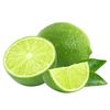 Limas verdes, una entera, una cortada a la mitad, una en gajo, con hojas verdes.