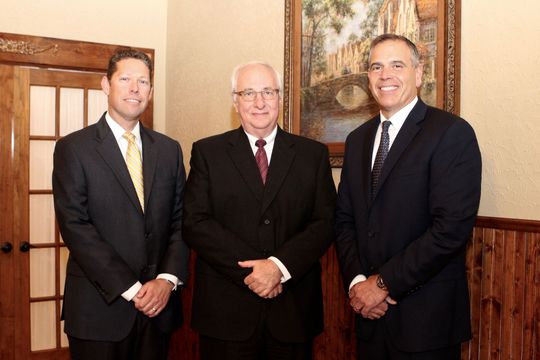 Attorneys Trent Bond, Chris Portner, and Tom Kiehnhoff