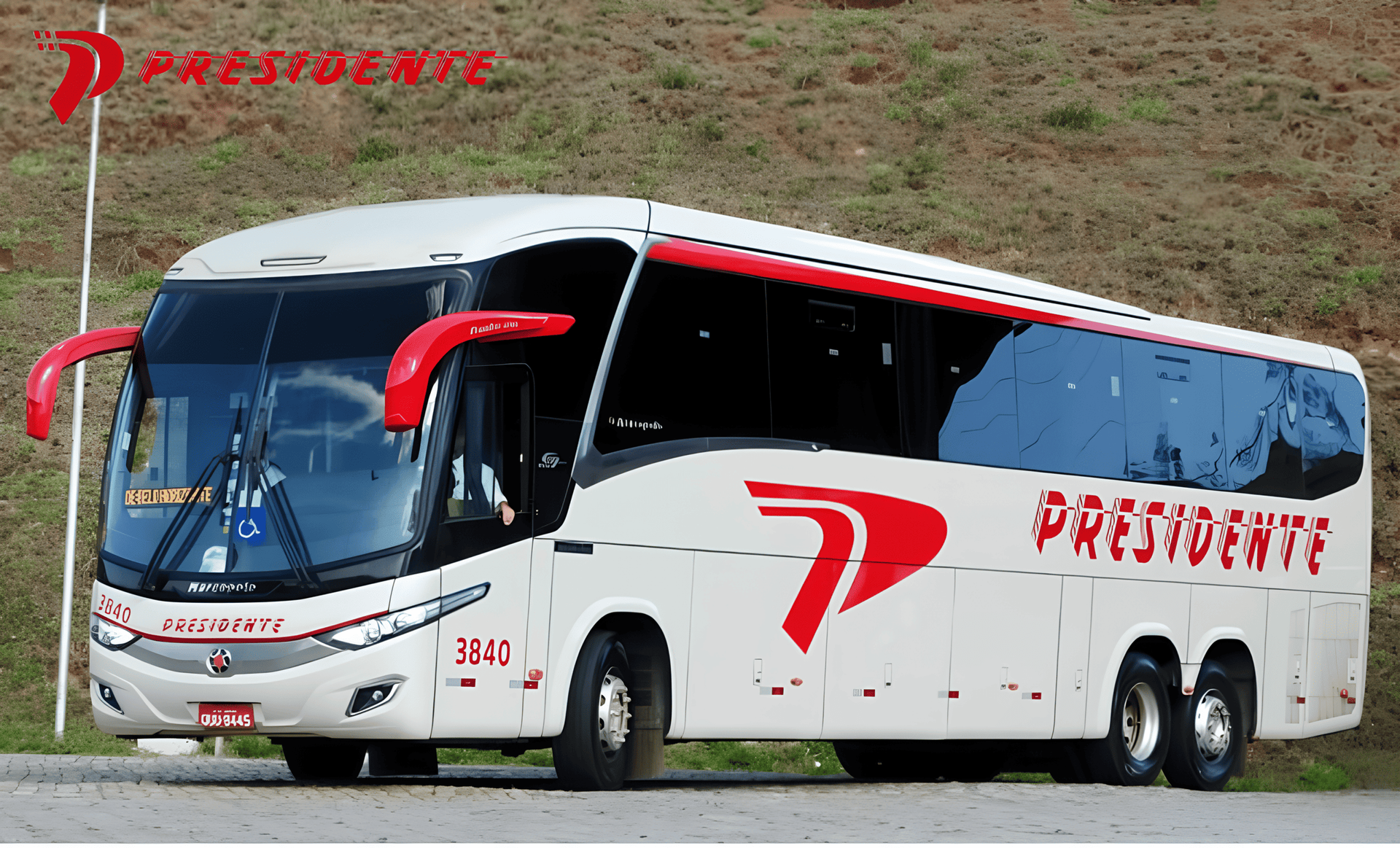 Ônibus de turismo Prevost branco e vermelho estacionado em uma estrada ao lado de uma encosta gramada.