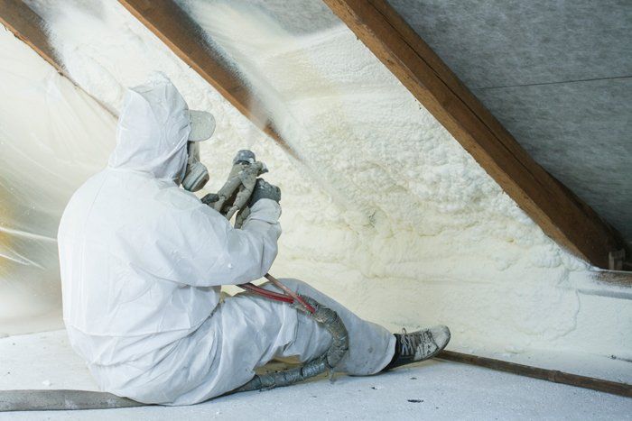 Technician Spraying Foam Insulation — Medford, OR — All Phase Weatherization & Construction LLC