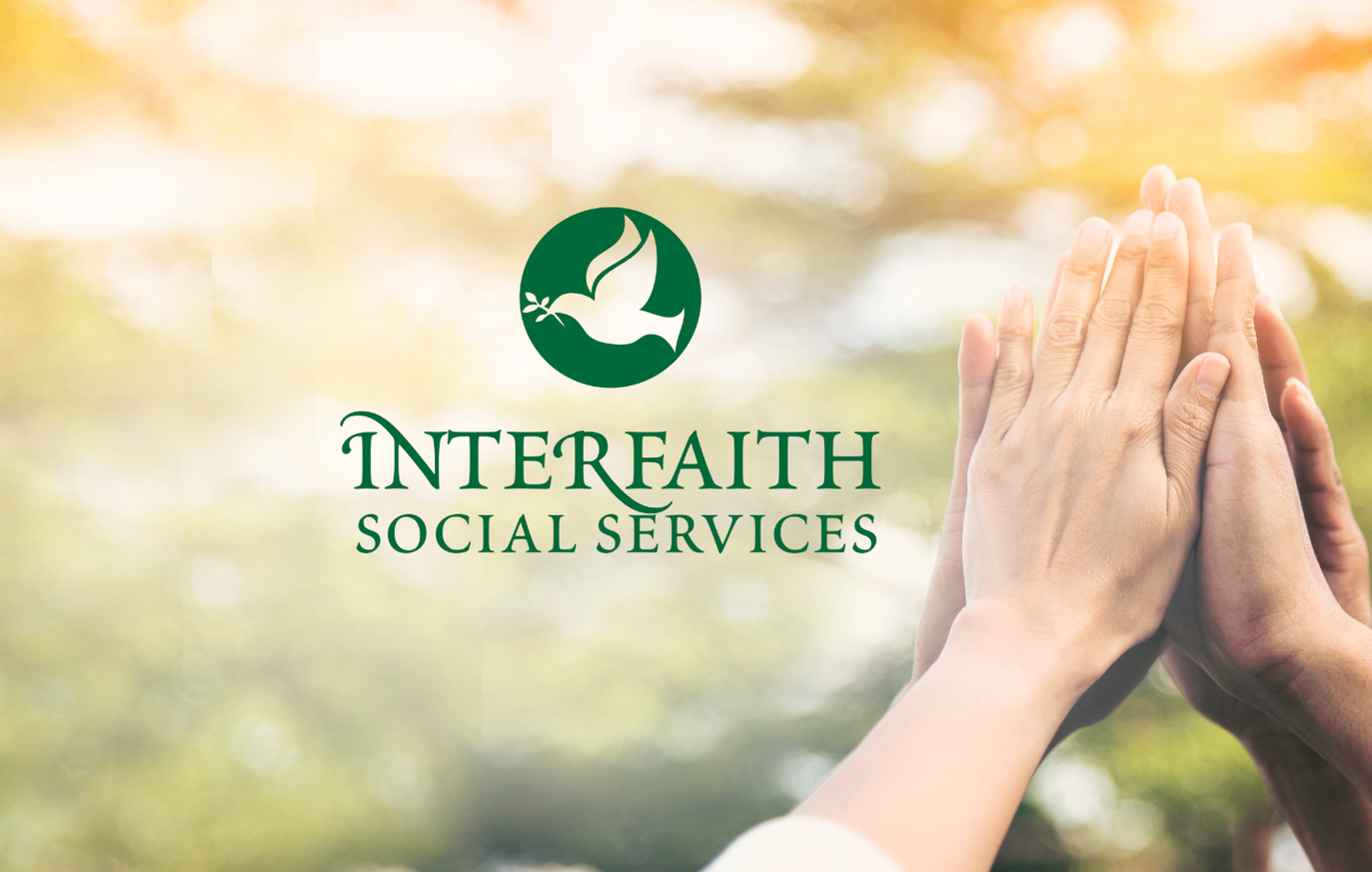 Interfaith Social Services logo over a soft-focus background with hands in prayer