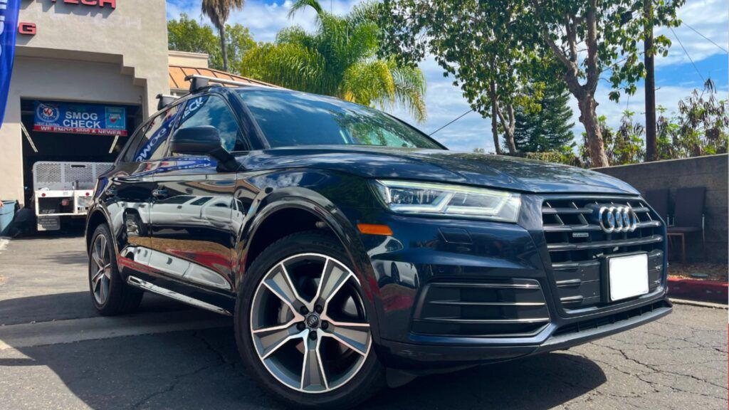 Audi Q5 black car parked outside of our shop | Euro Auto Tech & Smog