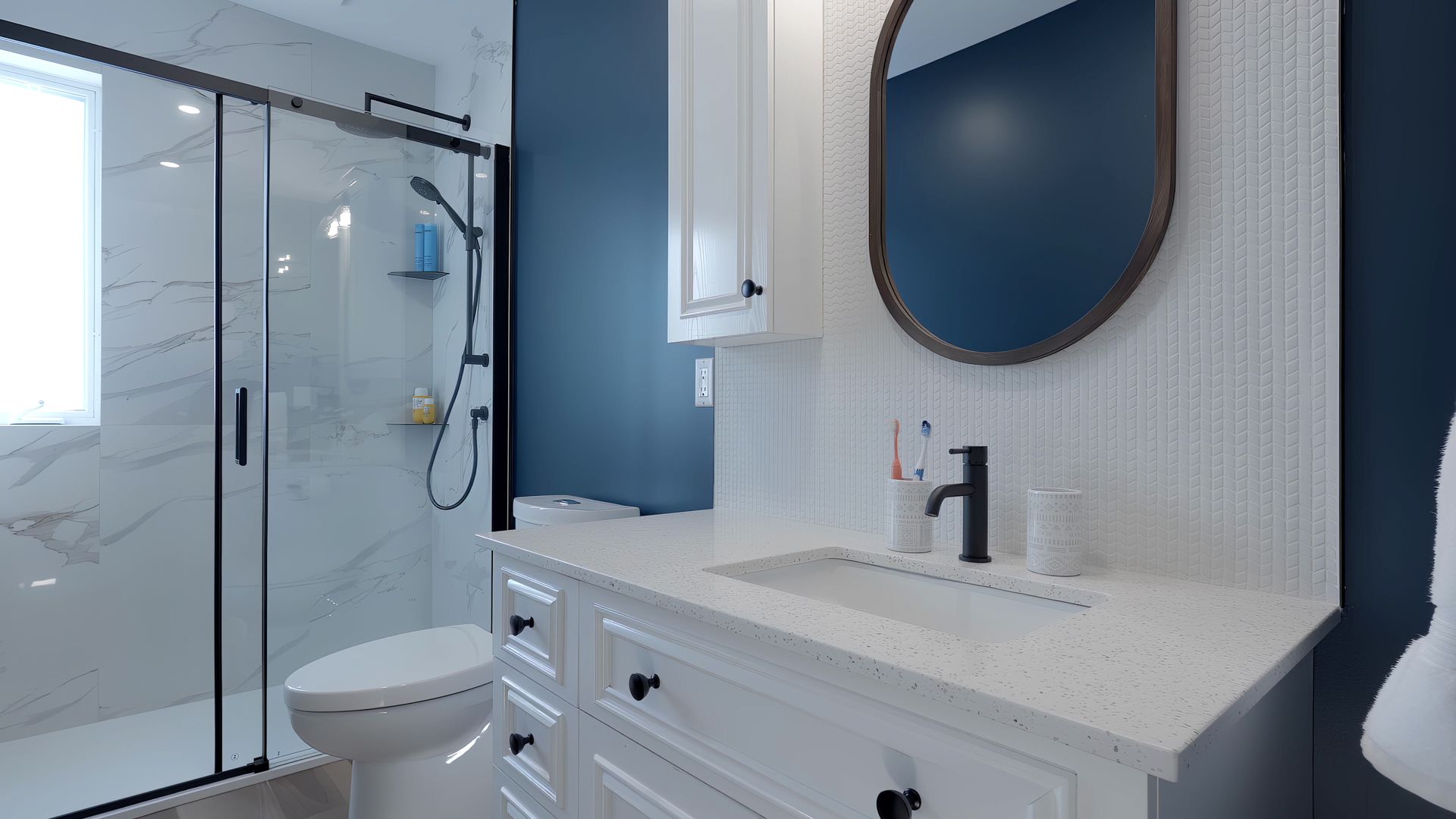 A bathroom with a toilet , sink , mirror and shower.