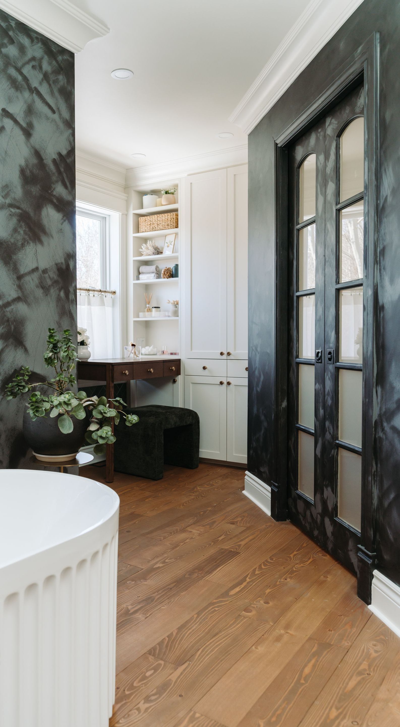 There is a bathtub in the middle of the room.