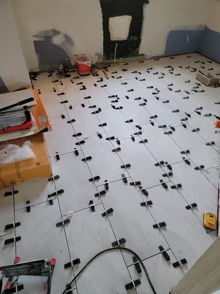 A room with a lot of tiles on the floor