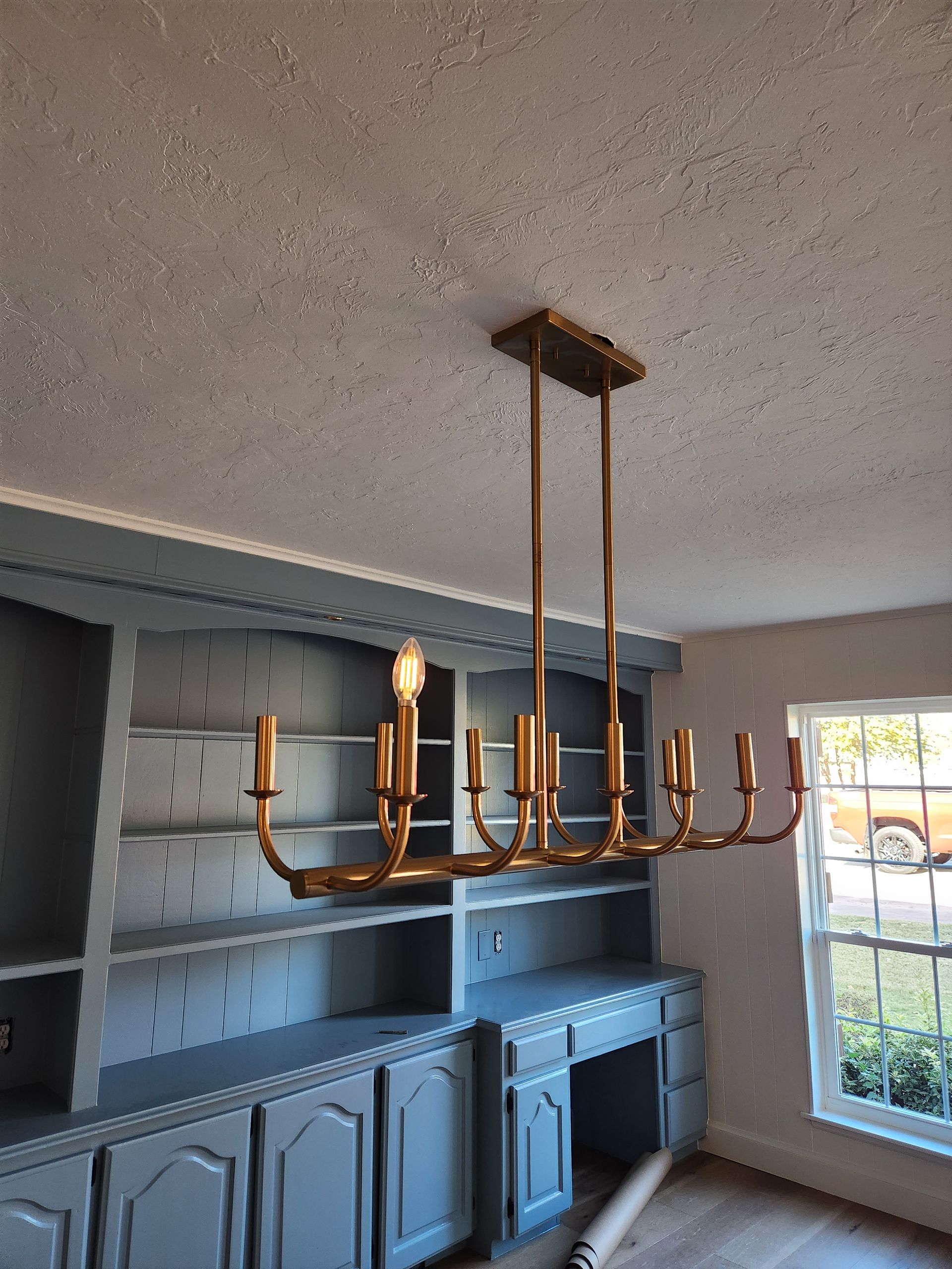 Updated light fixture in an Edmond home