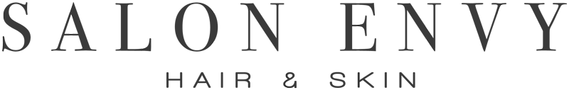 Salon Envy Hair & Skin logo with black text on a white background