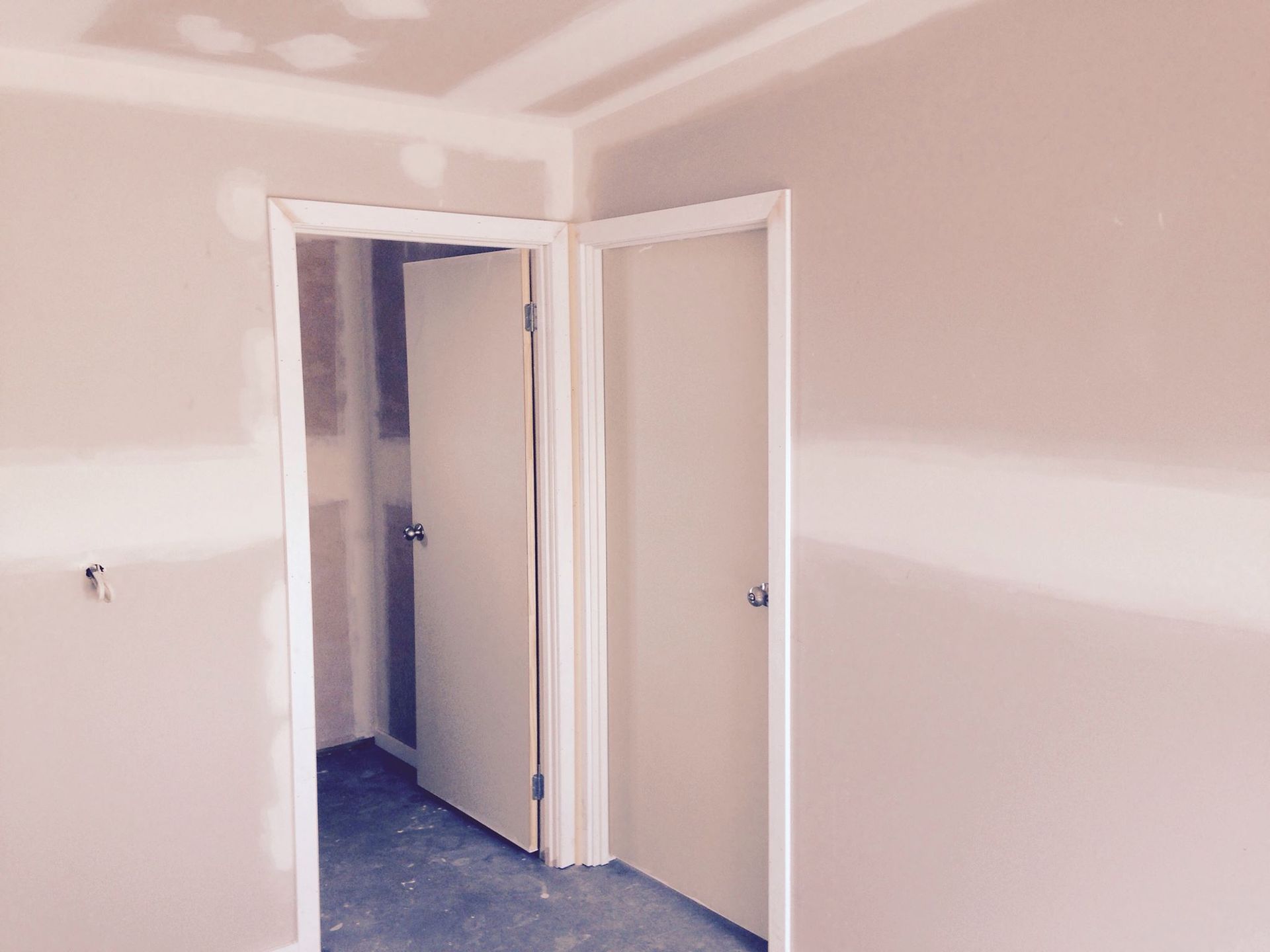 Pink Empty Room With a Door That is Open — Hancock Construction & Maintenance in Newcastle, NSW