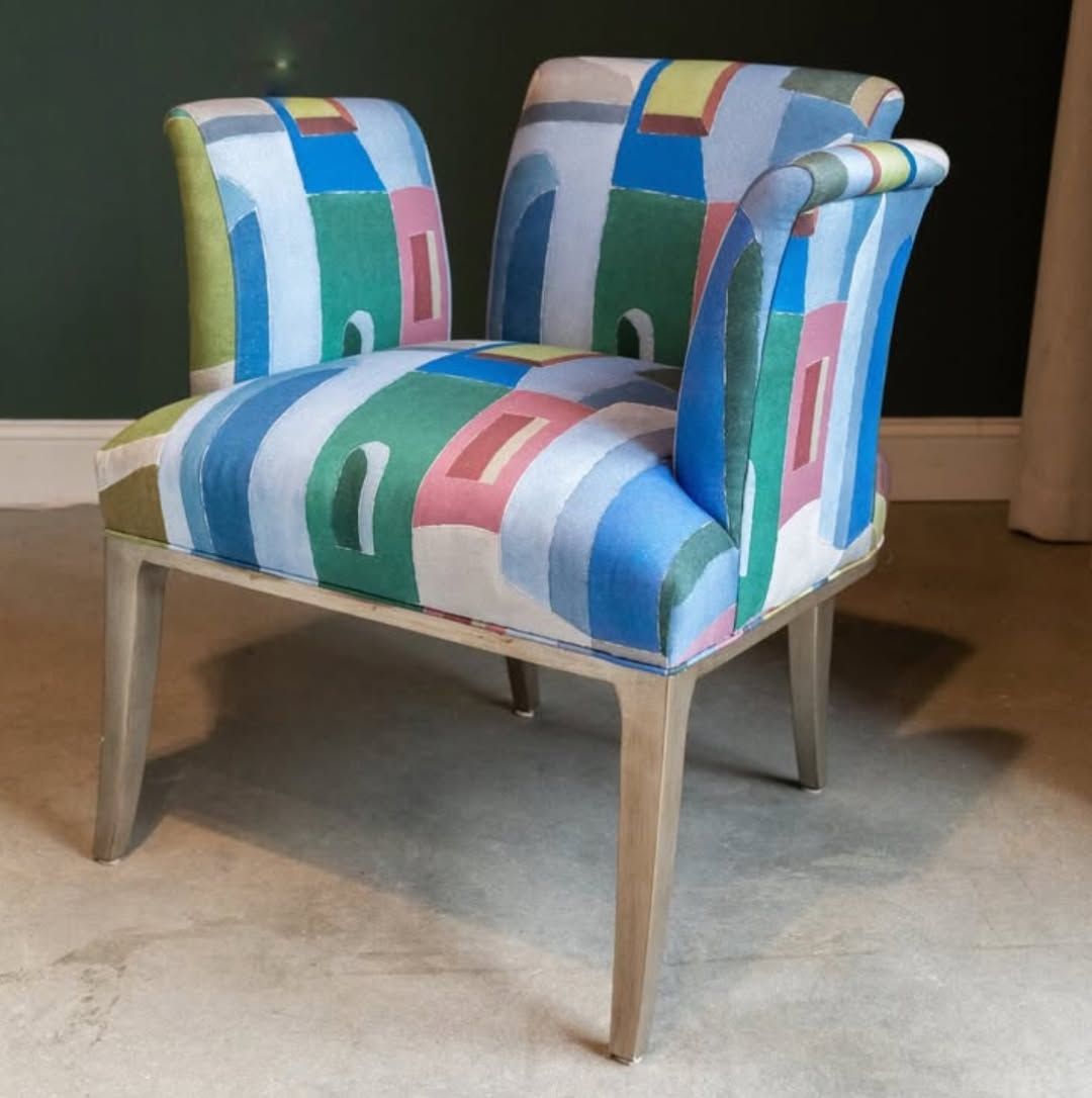 A chair with a colorful pattern on it