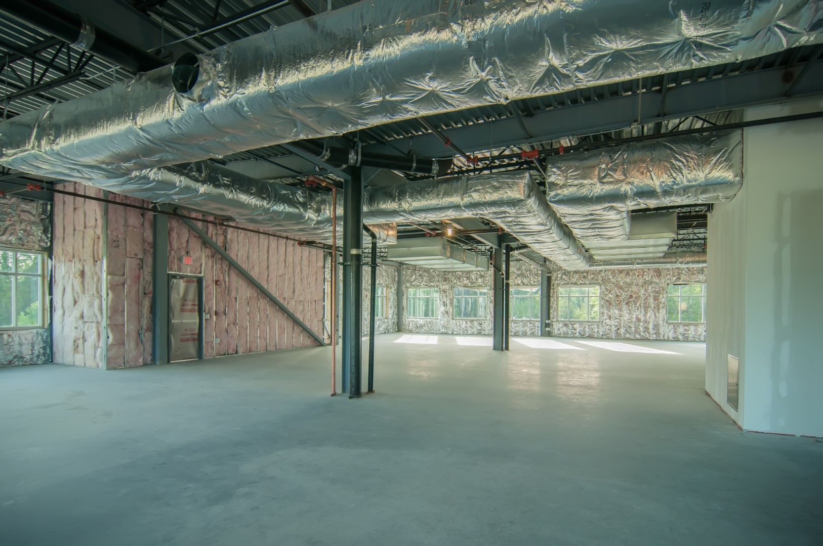 Commercial spray foam on ceiling air ducts.