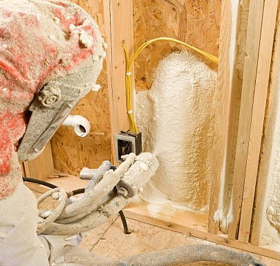 Spray foam expanding around electrical outlet