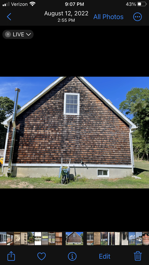 A picture of a house on a cell phone.
