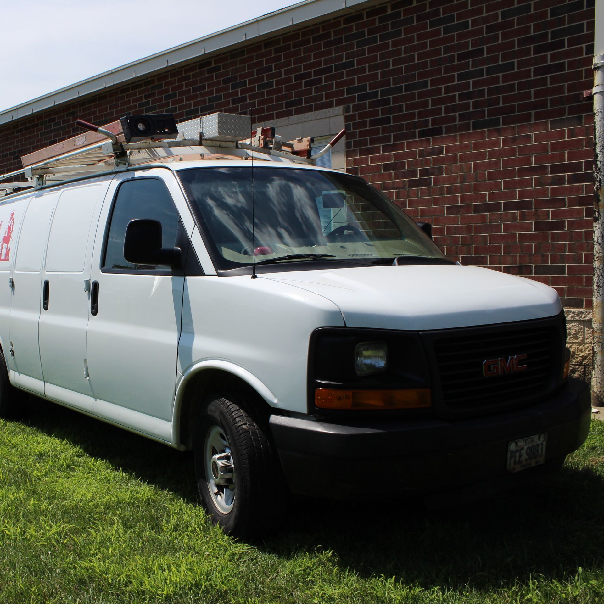 A Man Cleaning a Drain Hole | Grove City, OH | CST Utilities