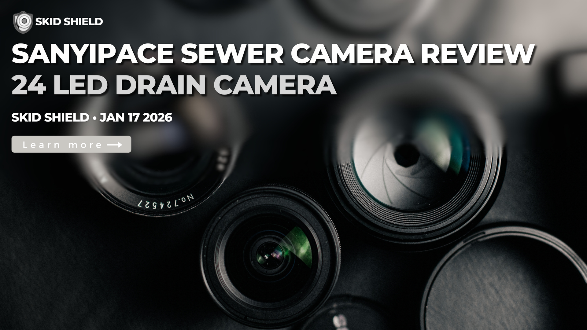4 camera lenses on black background