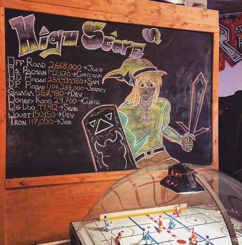 A chalkboard with a drawing of a knight on it