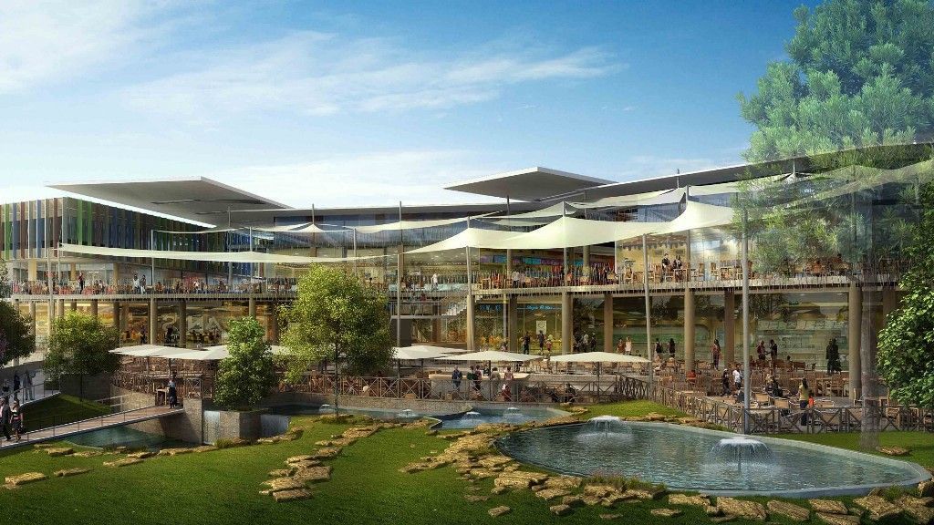 An artist 's impression of a large building with a pond in front of it
