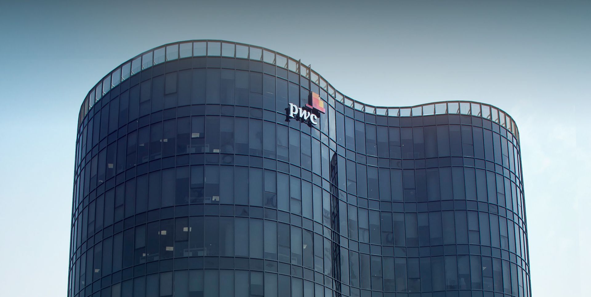 A large building with the word jmc on it