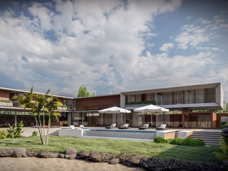 A large house with a pool and umbrellas in front of it