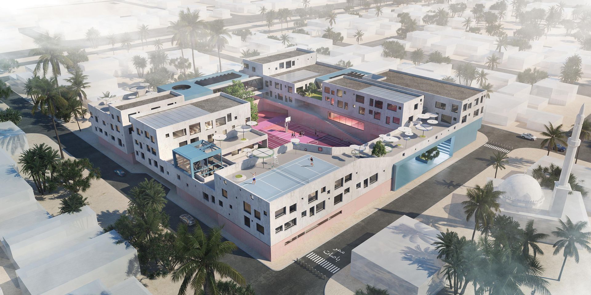 An aerial view of a large building in the middle of a desert