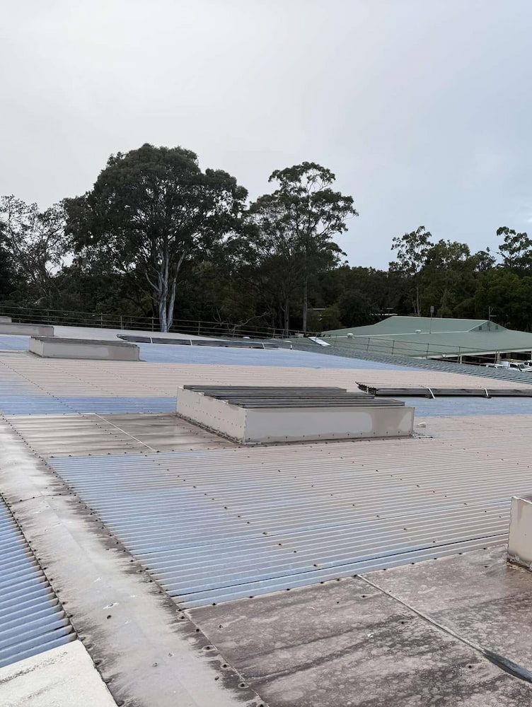 Corrugated Metal Roof With Square Skylights — Ace1 Metal Roofing in Forster, NSW